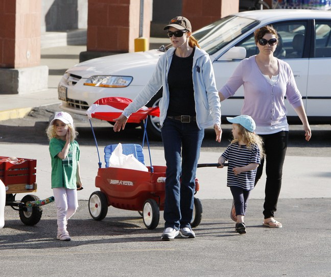 marcia cross, baseball hat, gray sweat shirt, gray jacket, jeans, black tshirt, sunglasses, belt