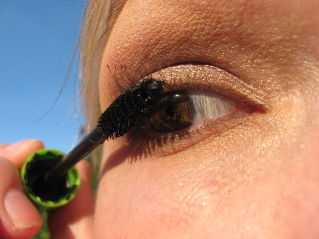 A close up shot of applying mascara