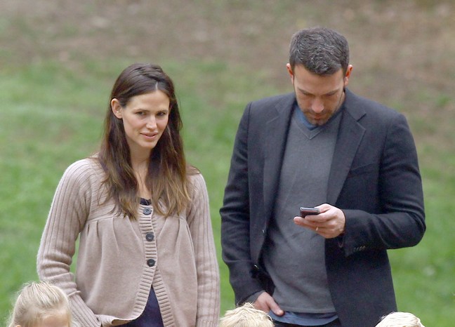 Ben Affleck, gray shirt, suit jacket, Jennifer Garner, brown sweater, beige sweater, jeans, athletic shoes