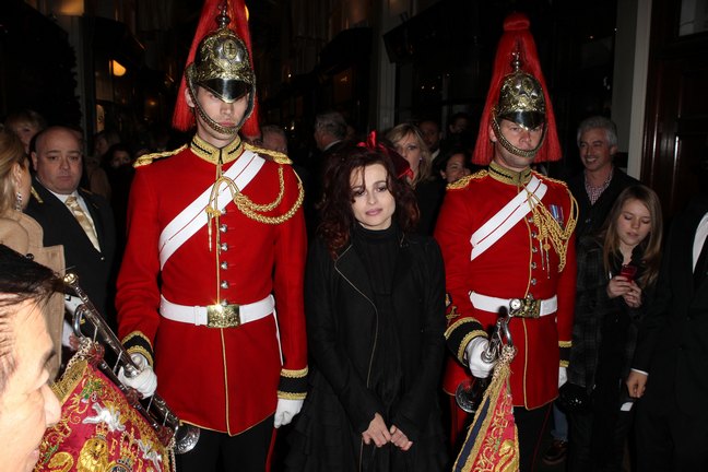 helena bonham carter, black coat, red bow