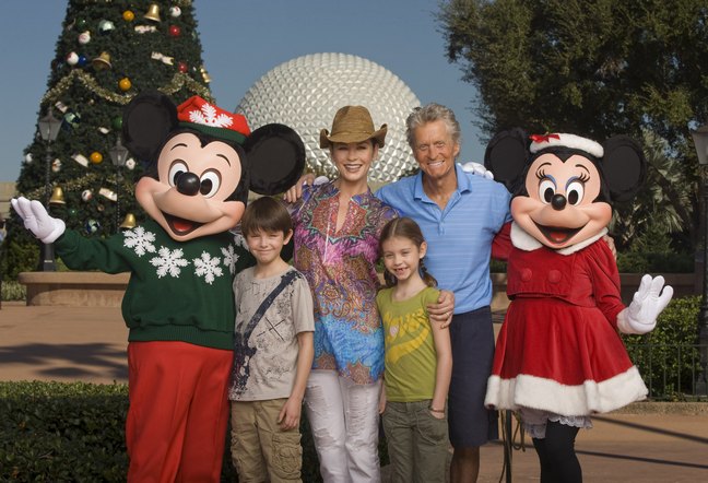 Michael Douglas, Catherine Zeta-Jones with Mickey Mouse and their children