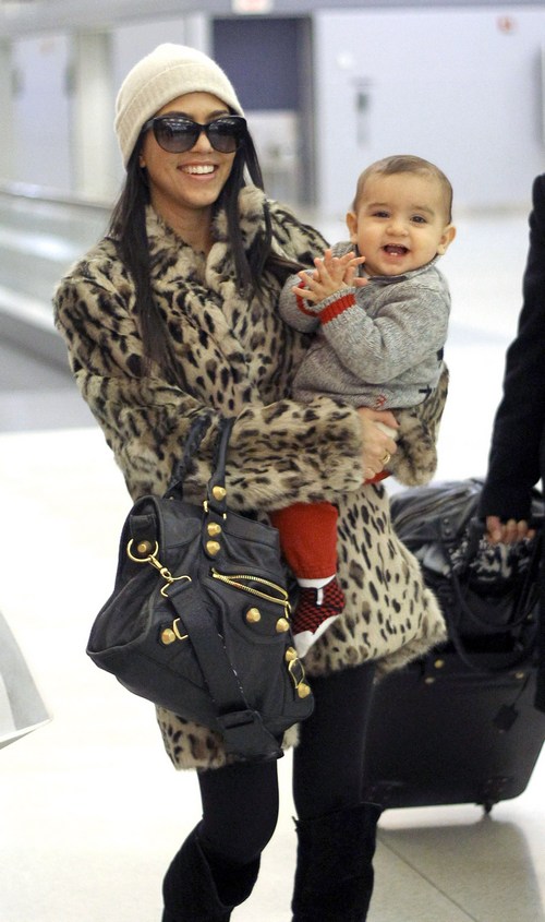 Kourtney Kardashian, leopard print coat, tan hat, black purse, sunglasses, black boots