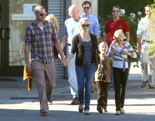 Reese witherspoon, black sweater, sunglasses, striped shirt, ballet flats