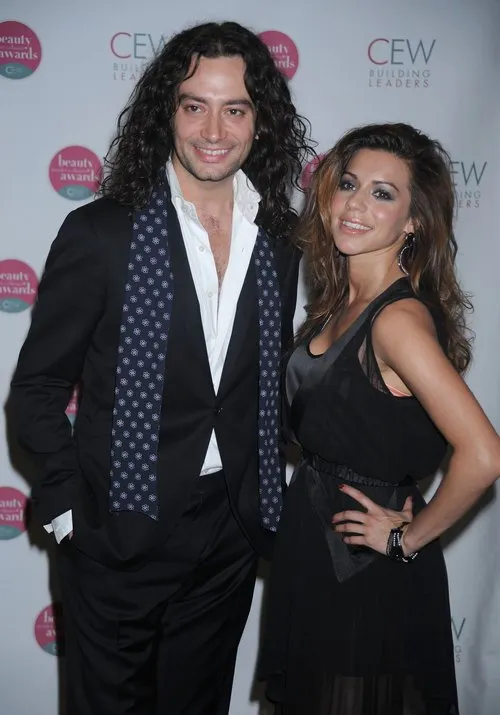 Constantine Maroulis, black jacket, white shirt, black pants