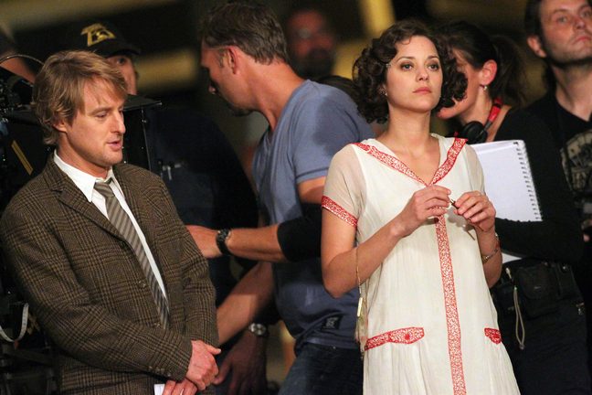 Marion Cotillard and Owen Wilson on set of Midnight in Paris