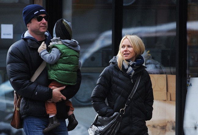 Naomi Watts, black coat, gray scarf, black purse