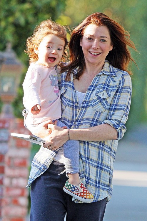 Alyson Hannigan, plaid shirt, blue pants