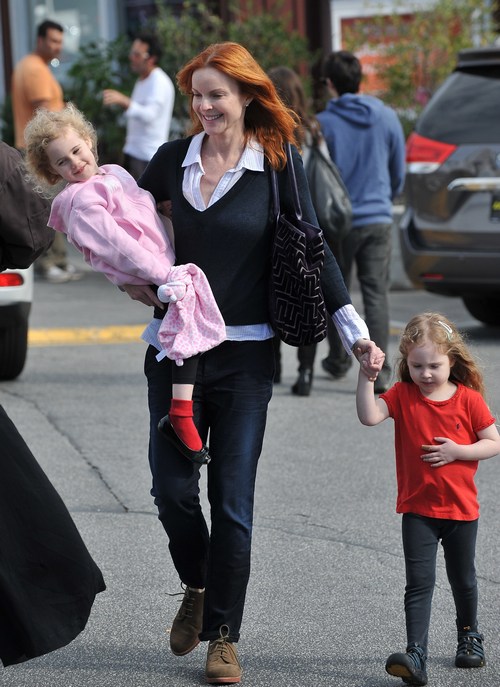 Marcia Cross, jeans, blue sweater, 