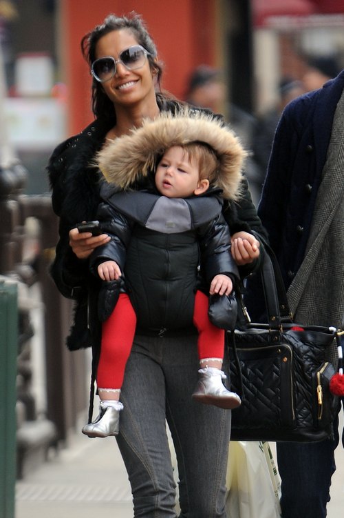 Padma Lakshmi, black coat, sunglasses