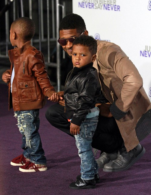 Usher, brown jacket, sunglasses