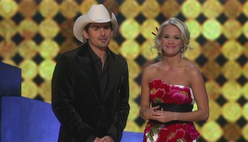 Carrie Underwood floral dress, Brad Paisley, black jacket, white cowboy hat