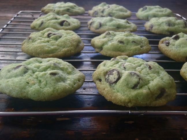 Green St Patricks Day cookies cooling on a wire rack