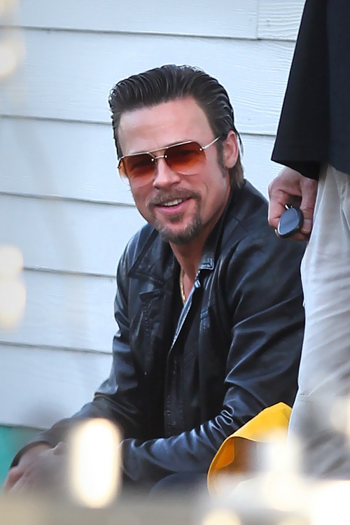 Brad Pitt, black leather jacket, sunglasses, movie set
