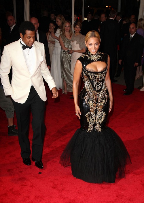 Jay-Z white tux, Beyonce gold and black gown