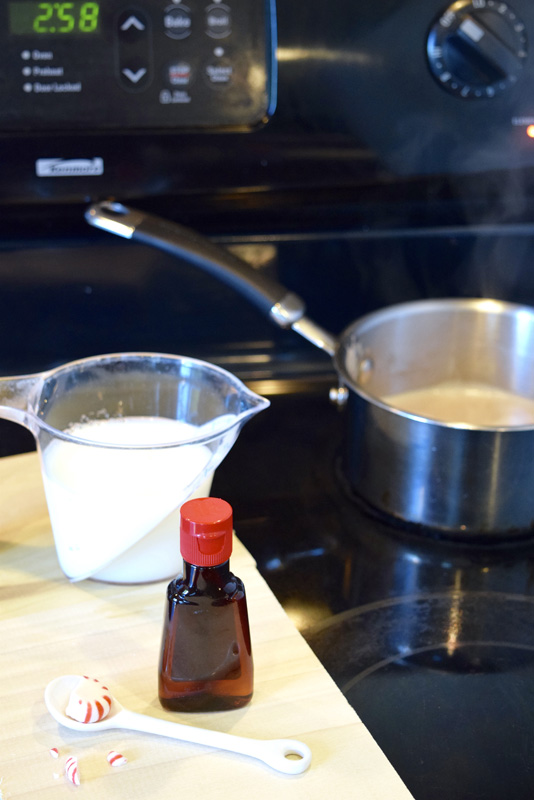 Boiling cream on stove for peppermint latte