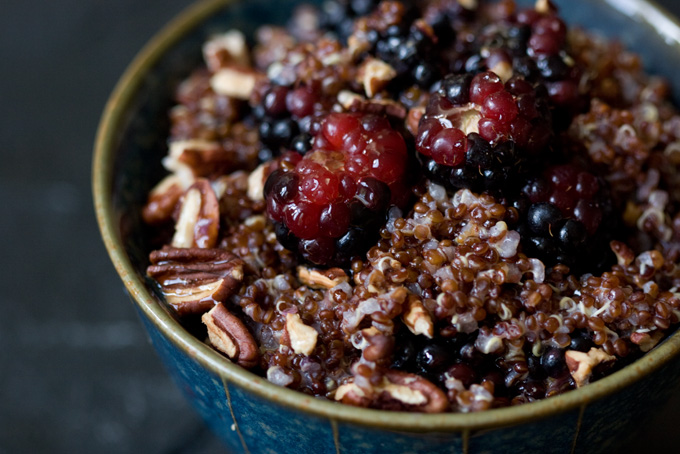 Nutty, Cinnamon Bery Quinoa Recipe in a green bowl