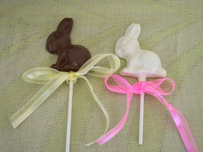Chocolate Easter Bunnies - Step 8 homemade chocolate bunnies on lollipop sticks with colorful ribbon