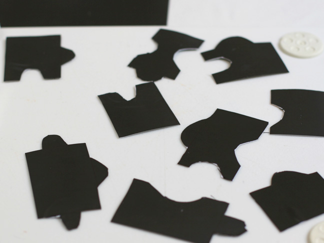 black magnet puzzle pieces