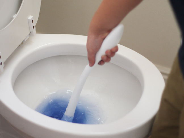 the toiletwand tinges the toilet water blue