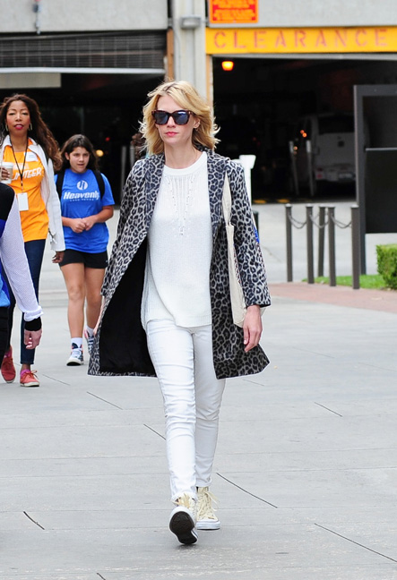 January Jones with a bright leopard print coat