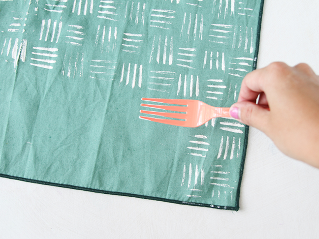 Use a fork to create a hash mark stamp for napkins