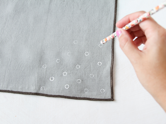 Use a straw to stamp pola dots on napkins