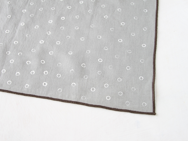 Use a straw to stamp pola dots on napkins.