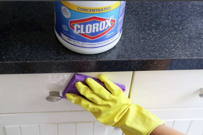 Clorox cabinet cleaning with gloves Jpeg