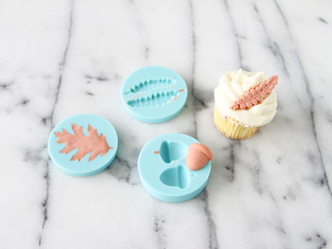 Adding the complete cupcake toppers to cupcakes