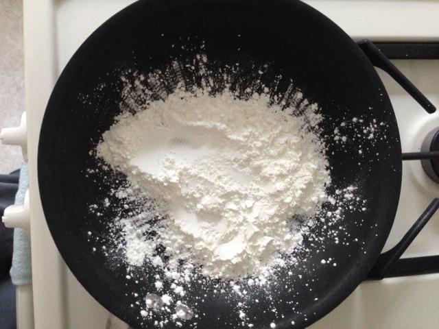 mixing dry ingredients for baby powder