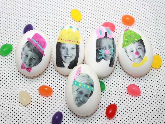 kids faces on easter eggs with jelly beans