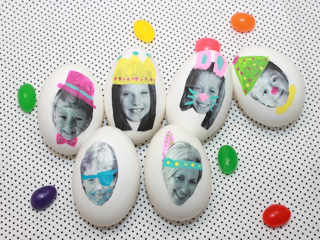 kids faces on easter eggs with jelly beans