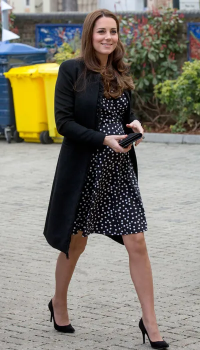 E! reports that Middleton's black-and-white maternity dress was by ASOS --  and it cost a budget-friendly $63!