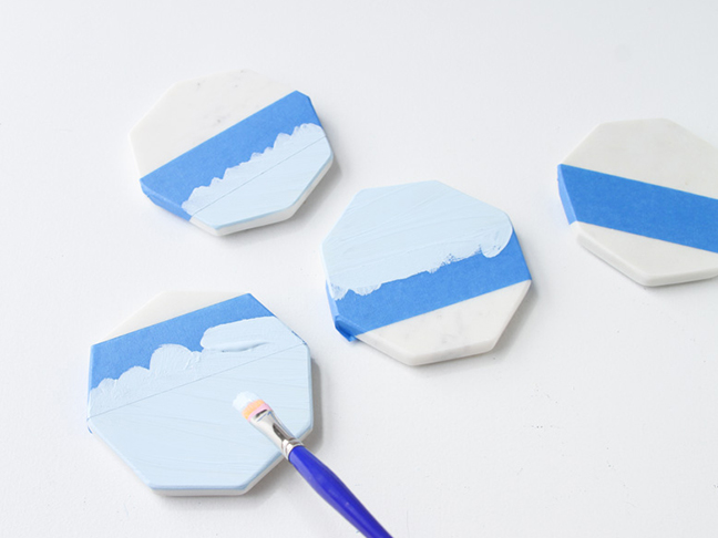 Paint coasters in pastel colors with acrylic paint.