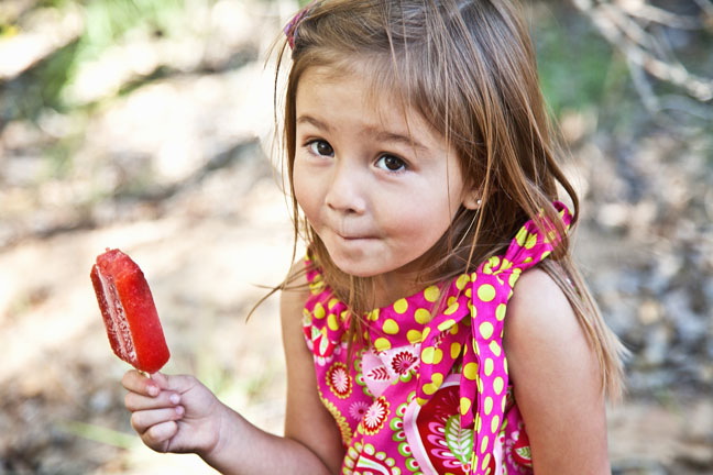 latina-girl-eating-popsicle