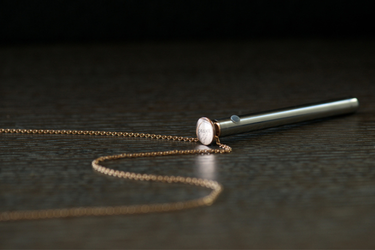 A rose gold Vesper vibrator by Crave