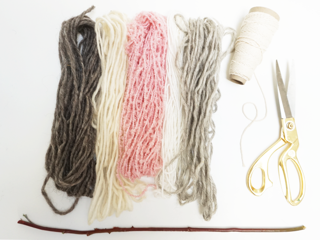 grey, white and pink yarn, fisherman string, scissors