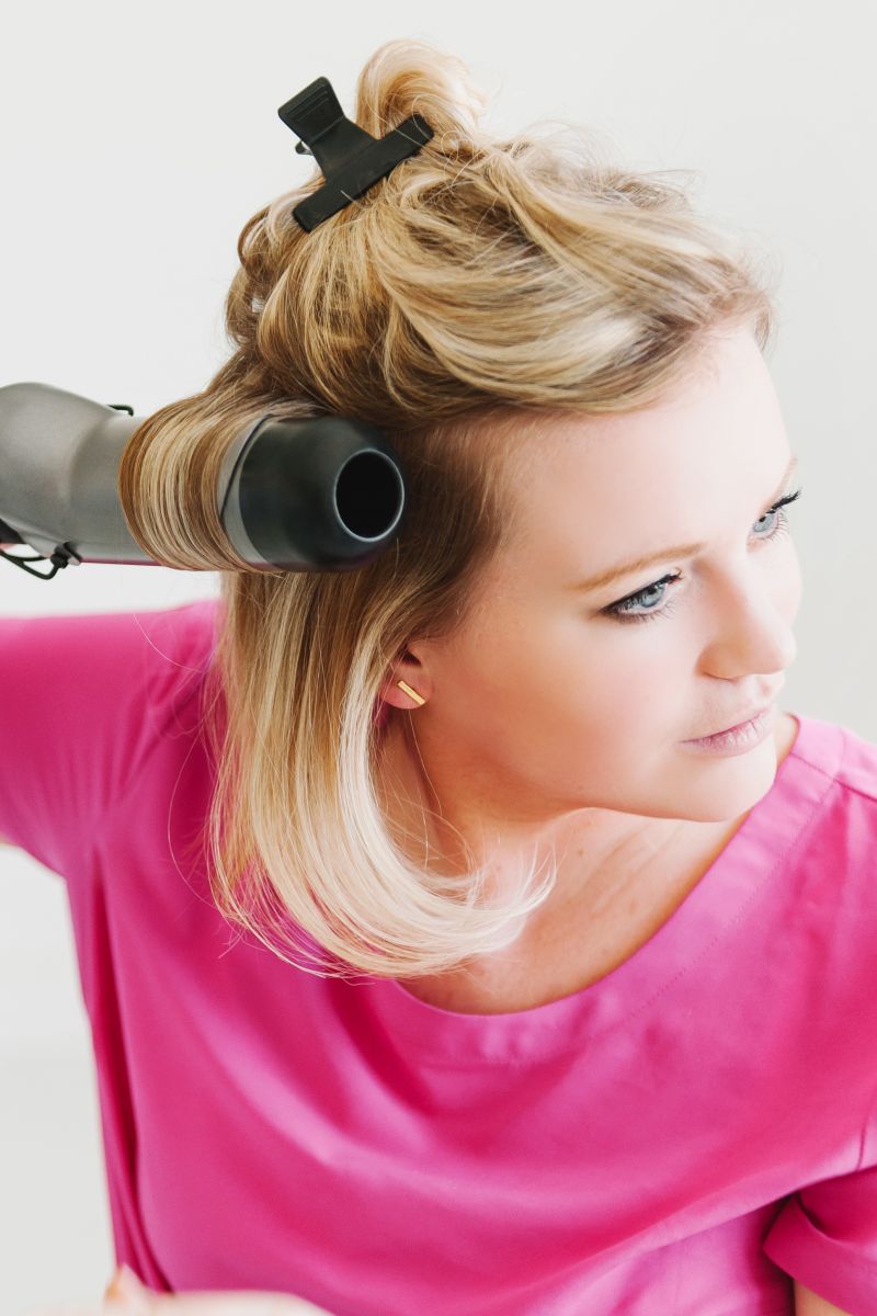 use_a_large_barrel_curling_iron_for_a_faux_blowout_at_home