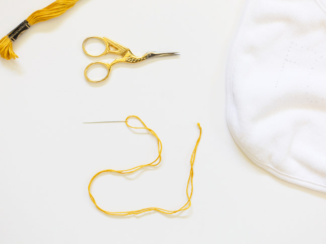knotted-embroidery-thread-needle-scissors