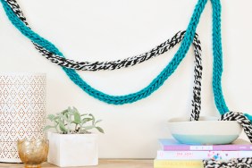 DIY Fingerknit Garlands styled on a wall