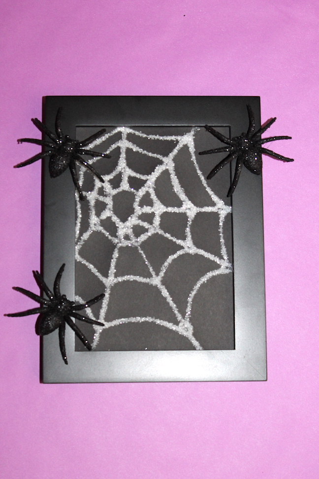 Frame final spider web photo frame with glitter spiders on it