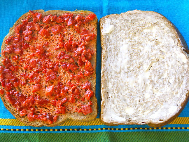grated cheese-red pepper-toast-blue cloth