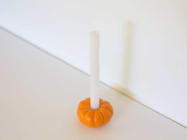 taper-candle-in-mini-pumpkin