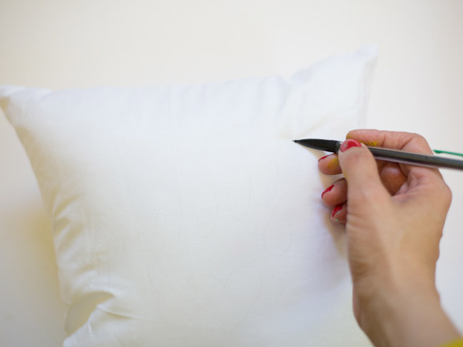 throw-pillow-hand-pencil