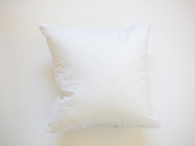white-throw-pillow