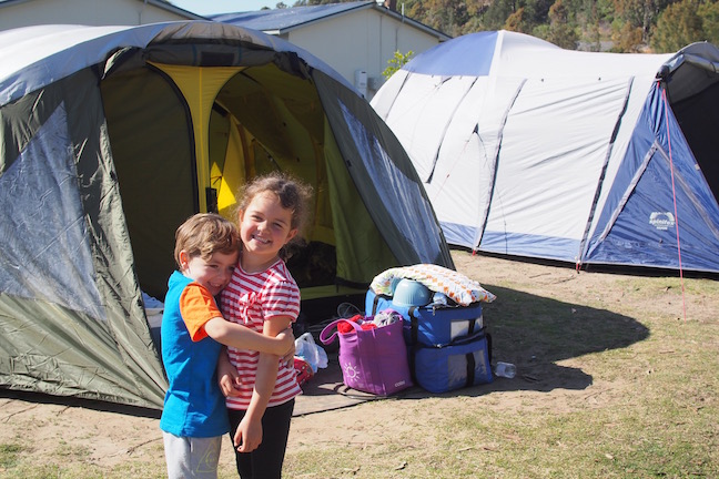 kids in front of the tent
