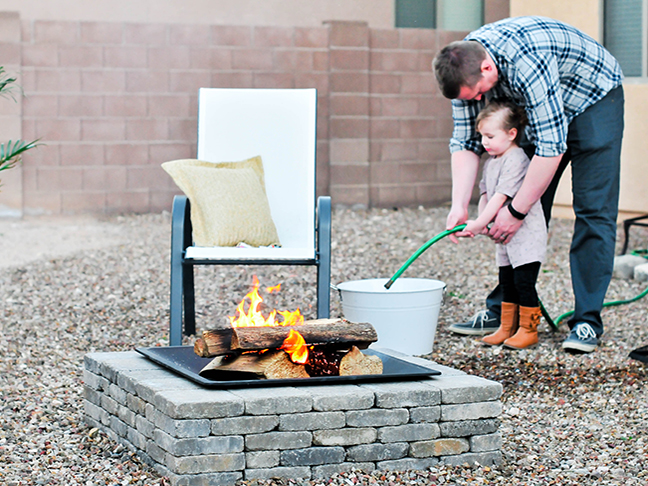 fire pit toddler water hose dad