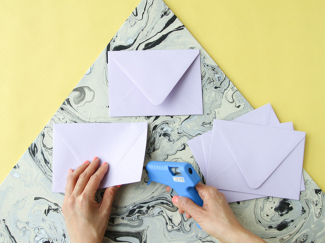 Glue envelopes to triangle base.