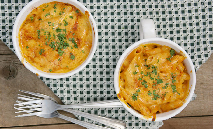 pumpkin mac and cheese in white cups