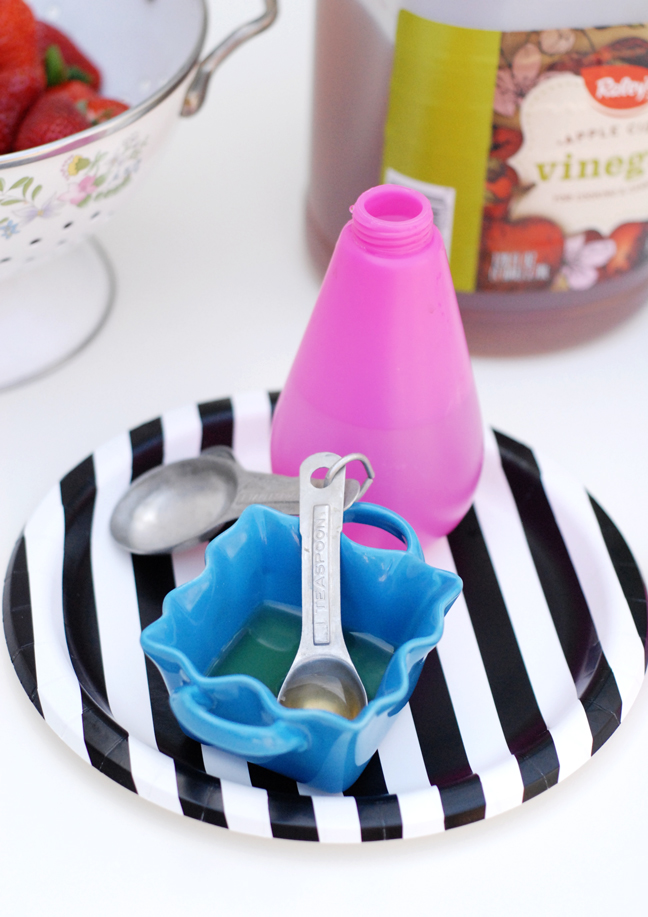 pink spray bottle measuring spoons